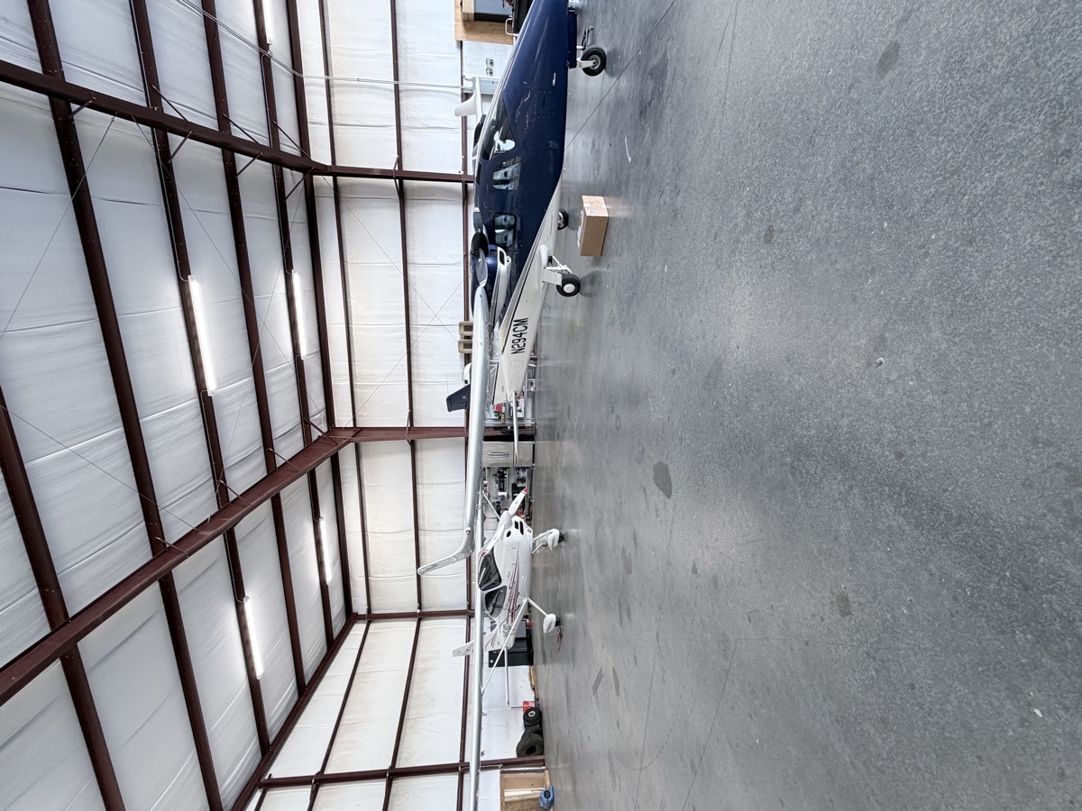 Aerolab mechanic working on aircraft